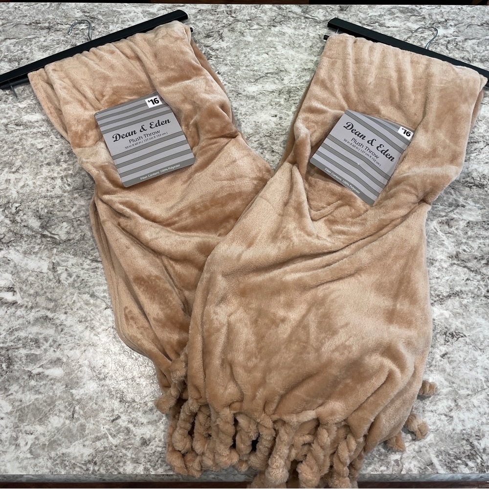 2- brand new Tan throw blankets